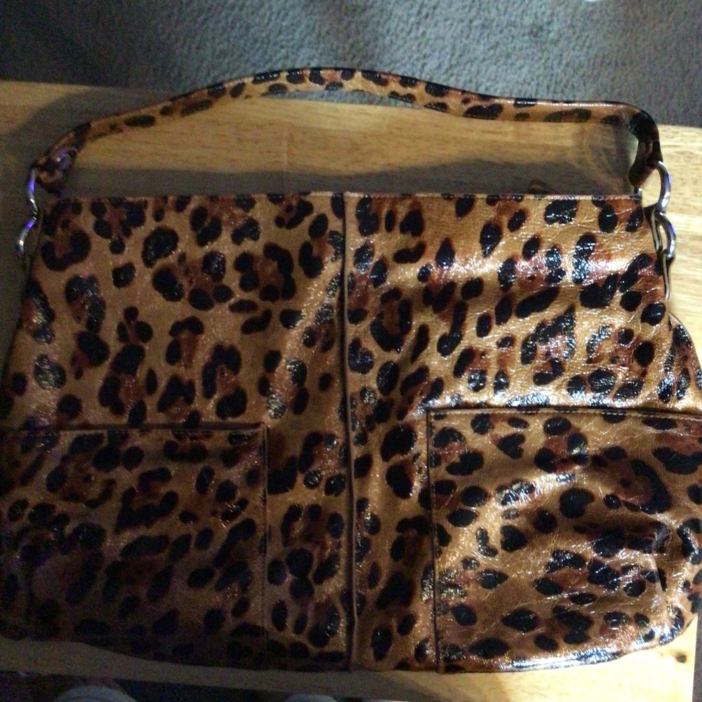 Lodis cheetah print hobo bag